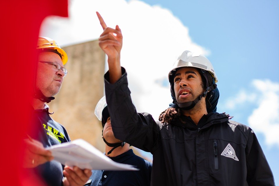 Engineer, checking completion of building work